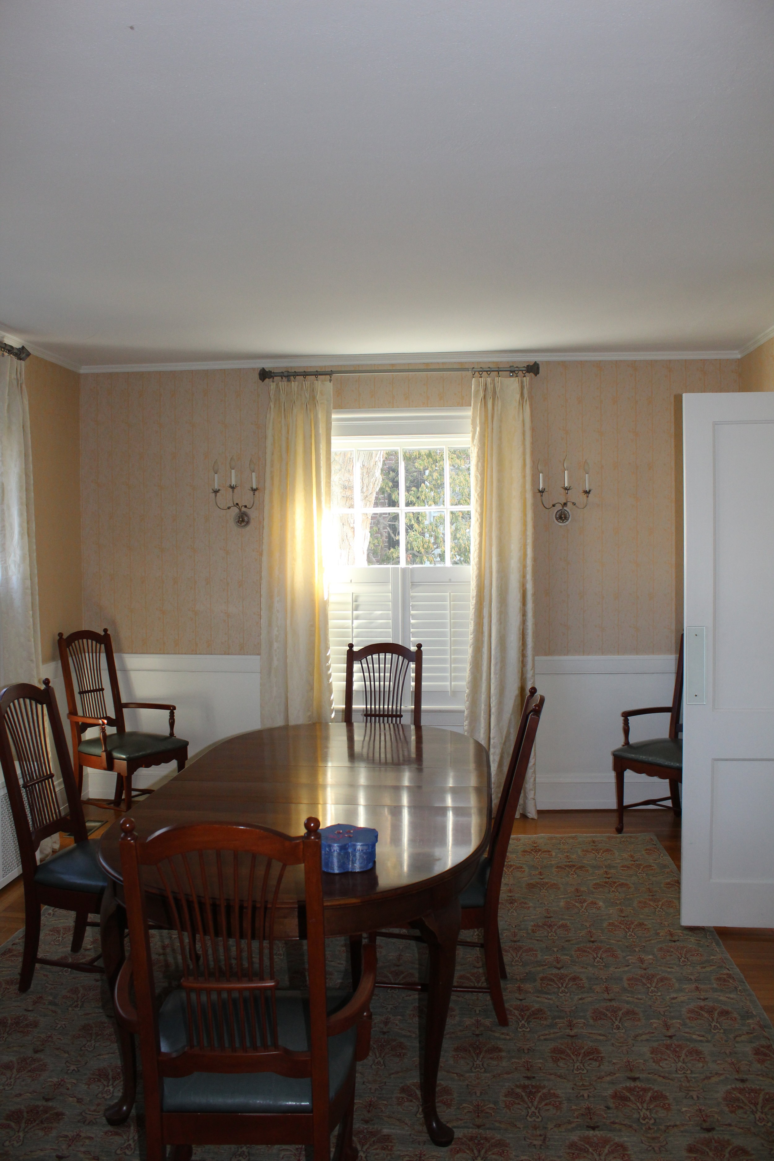 The dining room, full of windows, was far too dark for their liking and isolated from the rest of the first floor.