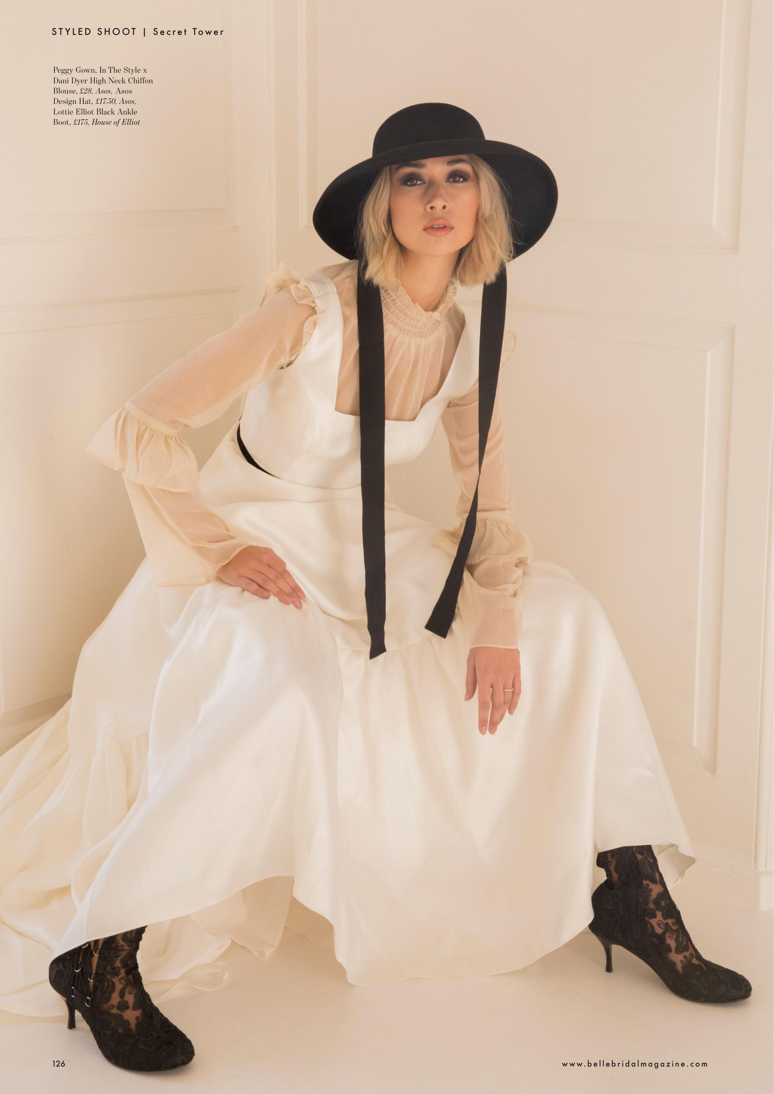 Belle Bridal Secret Tower - Crouching with black boots and hat.jpg