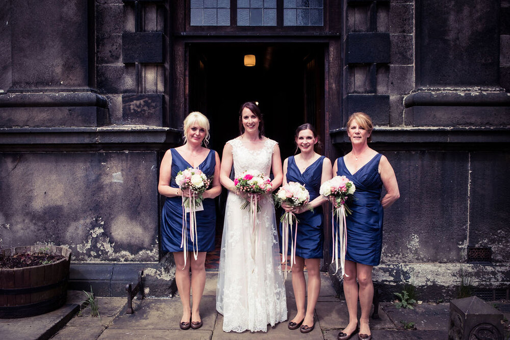Nicola with maids outside of church.jpg