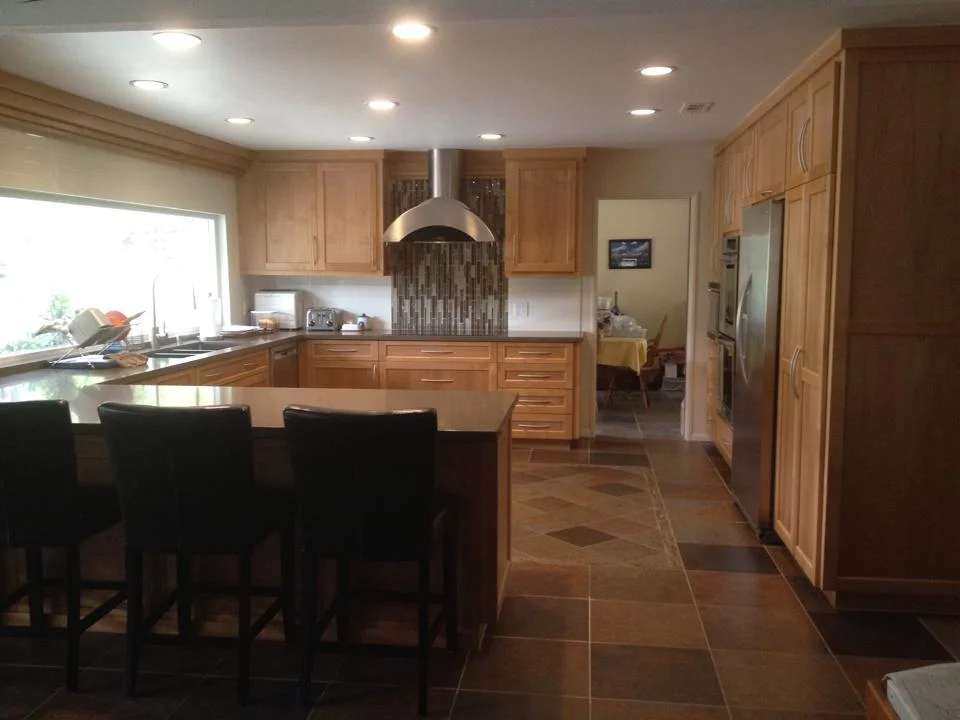 Orange County Kitchen Remodel with natural wood cabinets, tiled floors and open layout