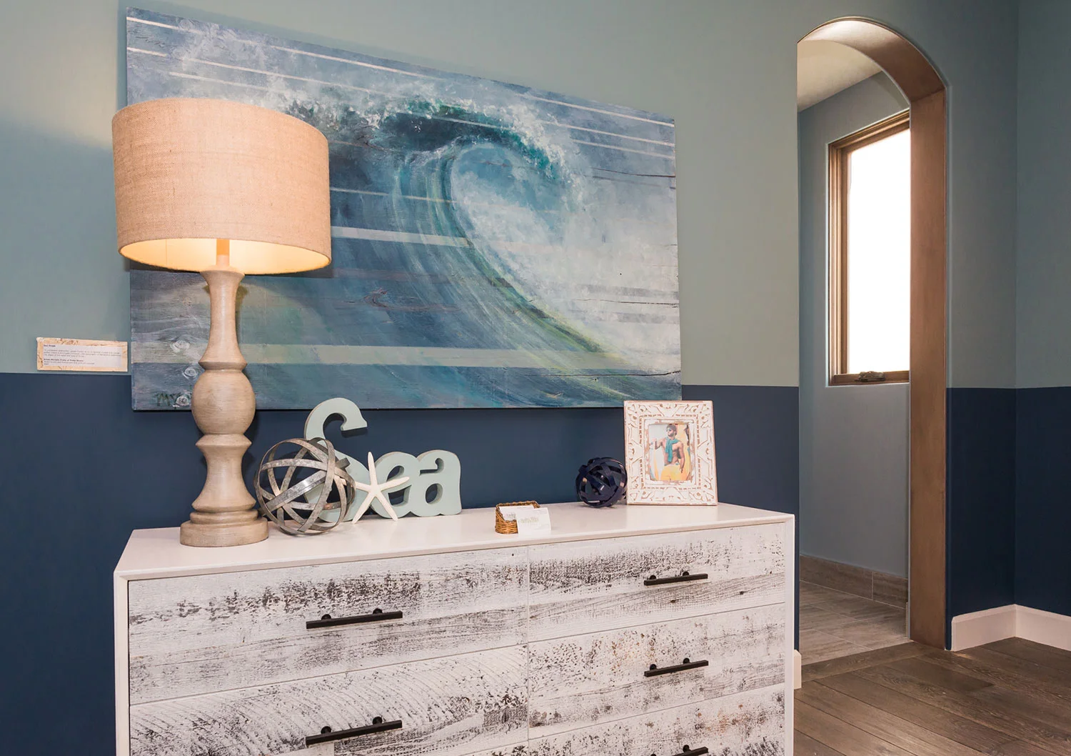 White Distressed Dresser with Open Arched Walkway to the Right