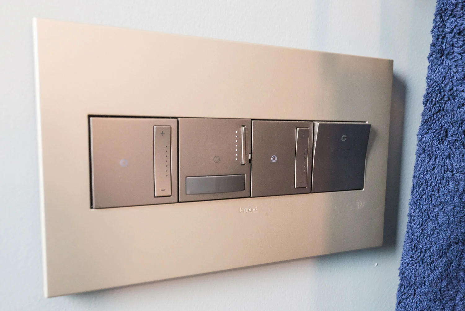 Custom high end light switches for teen boy bathroom design