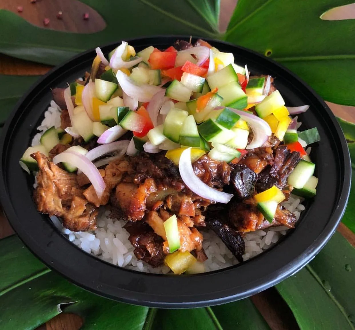 Braised pork belly with picked vegetables over rice