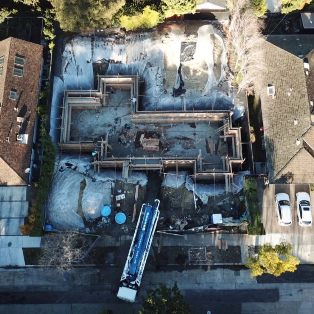 Construction of the basement foundation for a new Modern Farmhouse residence under construction in Palo Alto.