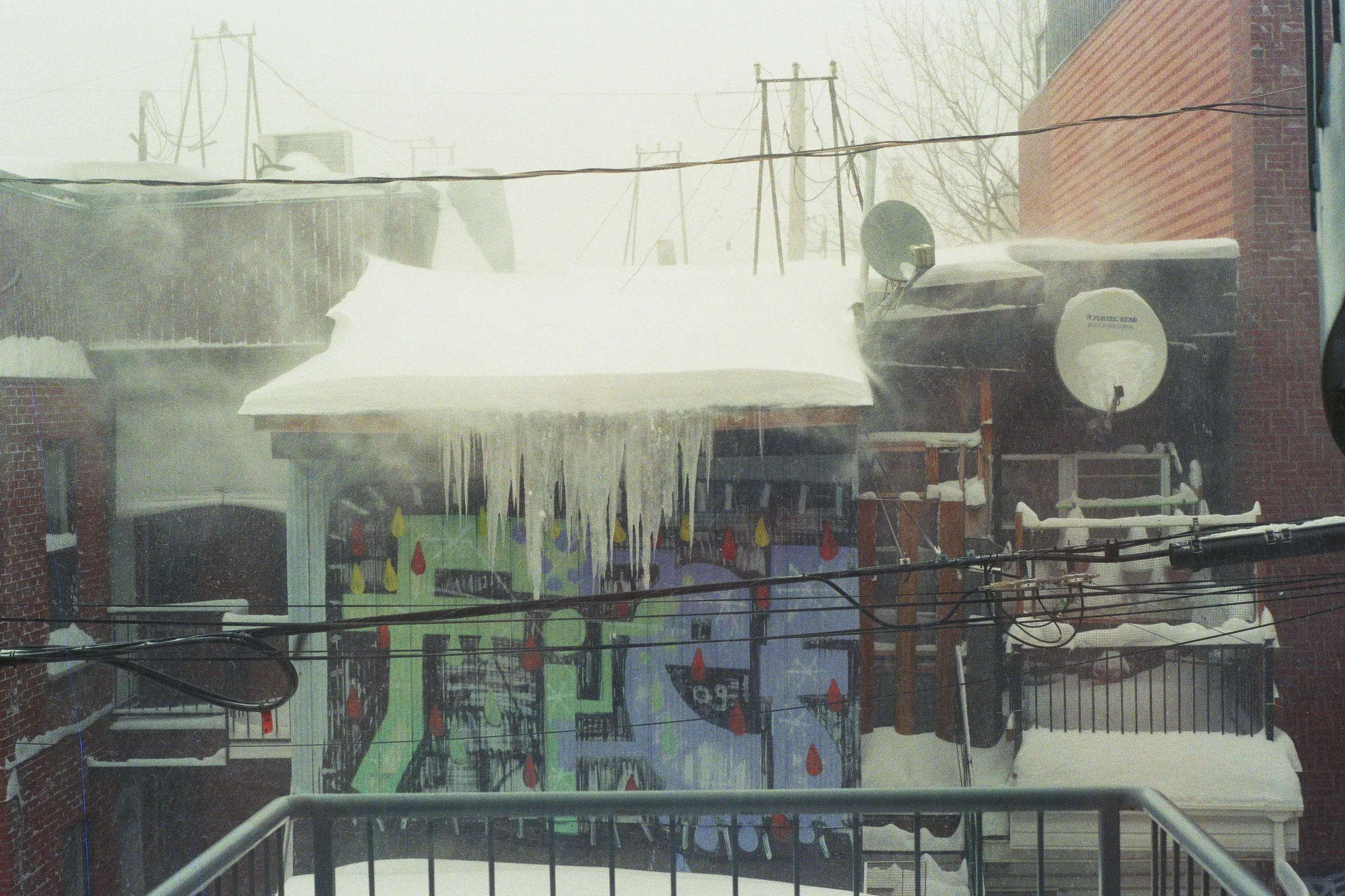 Looking out into the alley behind our Airbnb. Kodak Ultra Max 400. Pentax K1000. Fletcher Berryman 2019.