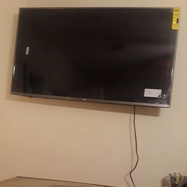 I set out to mount a 49” television on my wall. No one would mistake it for a success.