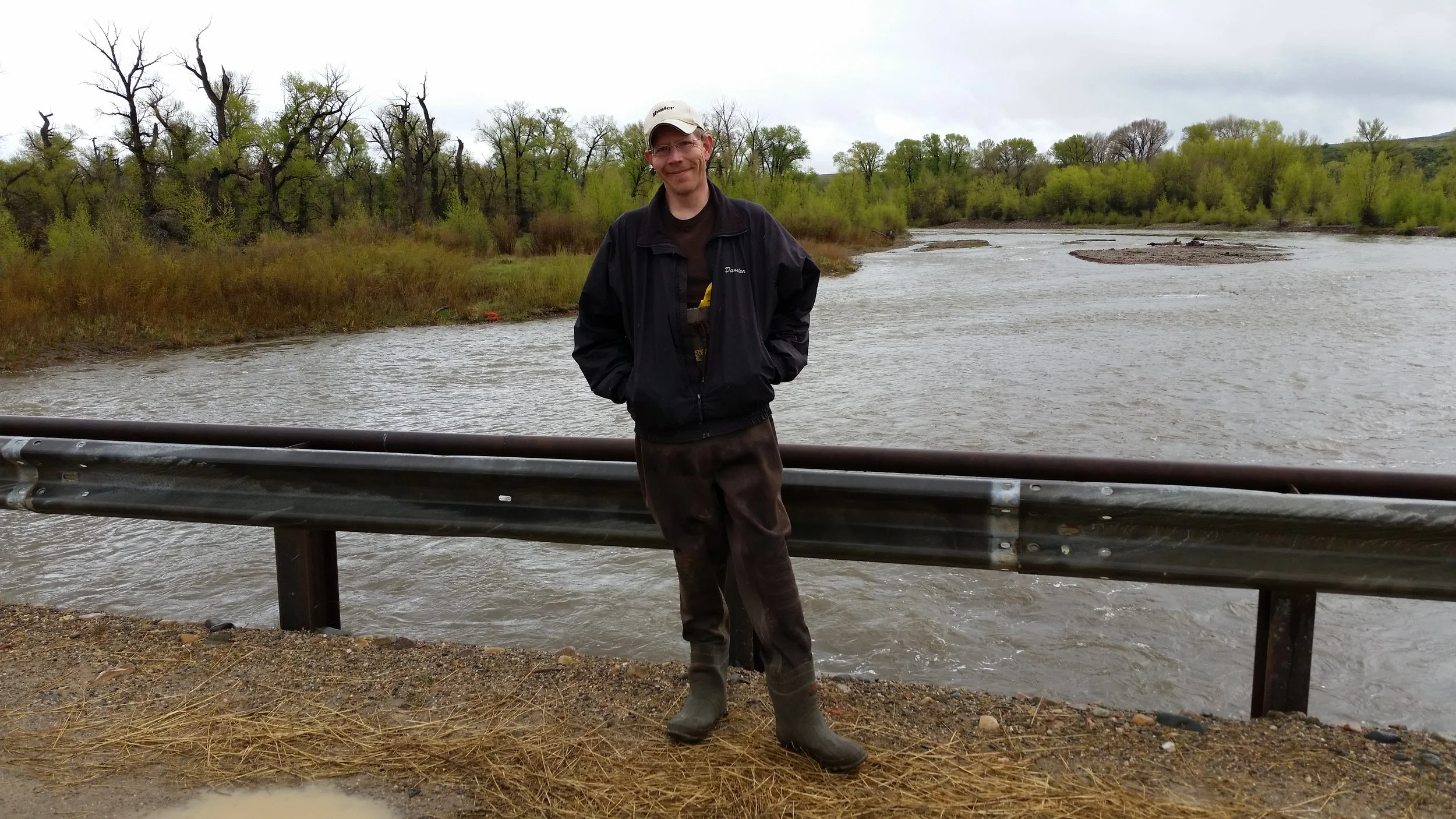 Damien Willis stands on a bridge over the Little Snake River near Dixon, WY.   