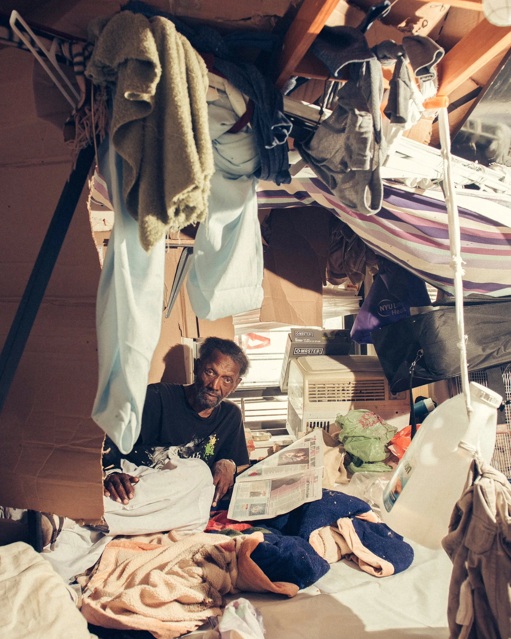 Abraham Clemente, who is schizophrenic, moved out of an adult home into his own Brooklyn apartment last year. “I don’t want to live like this,” he said in August. [Photo: George Etheredge for ProPublica]