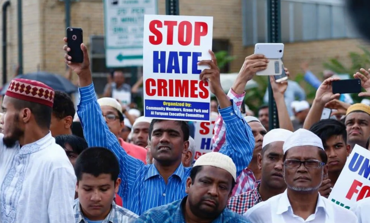 Community members gather during funeral prayers for Imam Maulama Akonjee and Thara Uddin, both of whom were shot dead&nbsp; Aug. 13, 2016, in the Ozone Park neighborhood of Queens. [Photo: Kena Betancur/AFP/Getty Images]