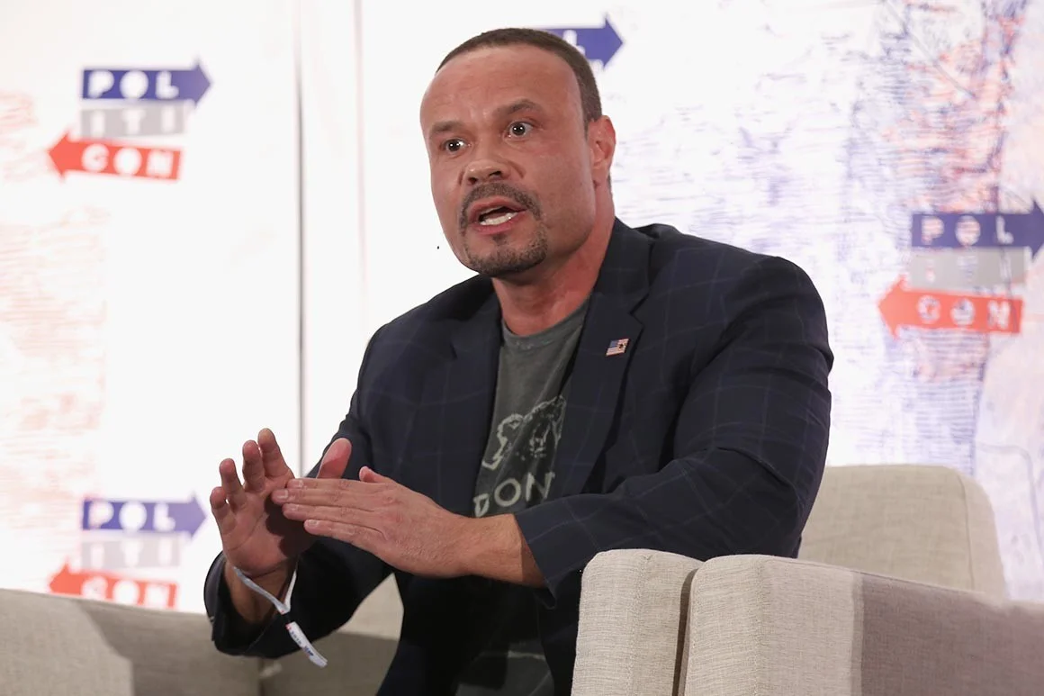 Frequent Trump cheerleader Dan Bongino declared while guest hosting for Sean Hannity that members of the president's base "want their wall and they want it now." [Phillip Faraone/Getty Images for Politicon]