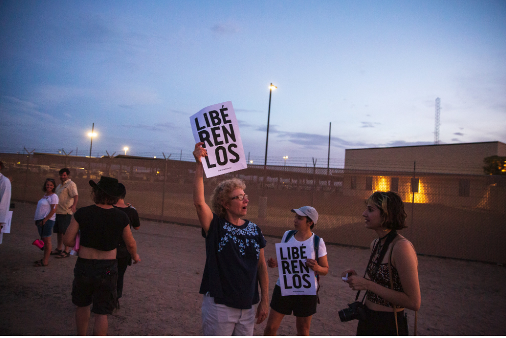 Protesters outside the Clint station on July 4. [Photo: Ilana Panich-Linsman / The New York Times]