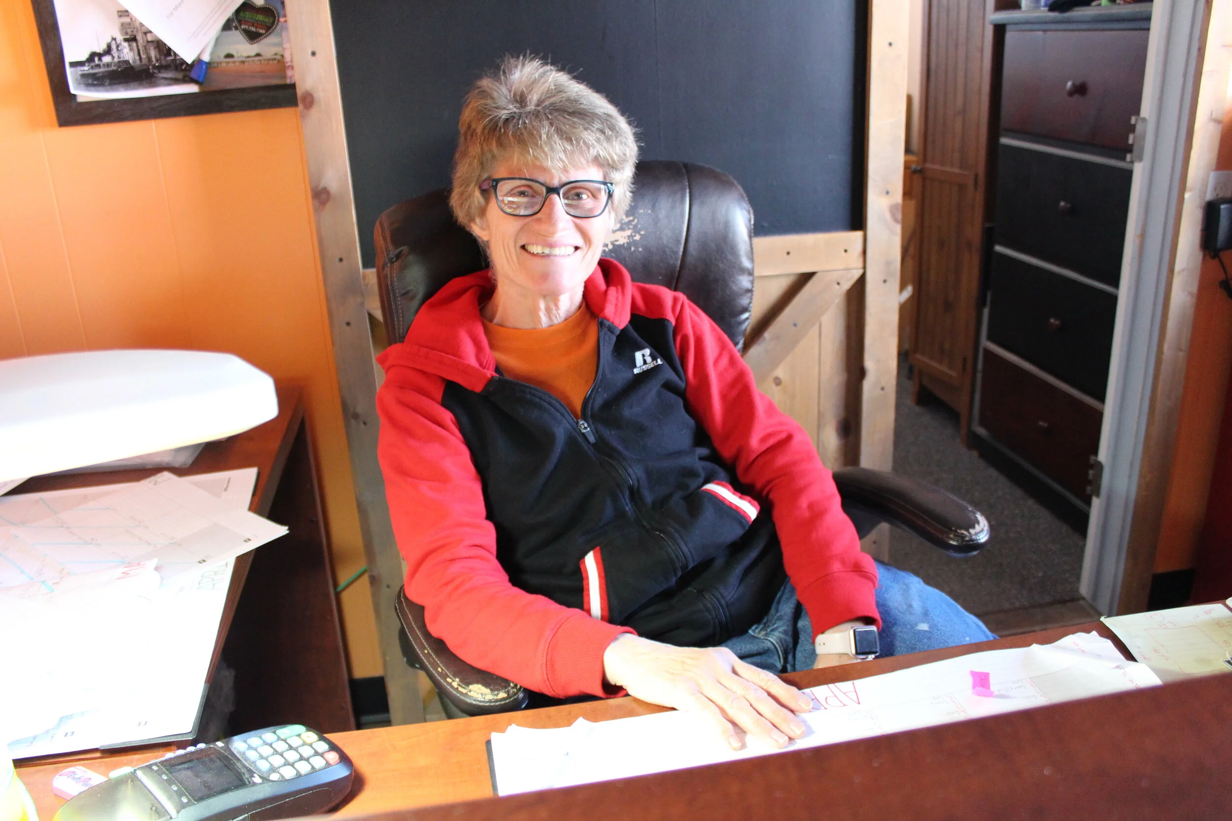 Rhonda Oord sits behind the front desk of the Corona Motel on Wednesday, April 15, 2020. [Damien Willis / Las Cruces Sun-News]