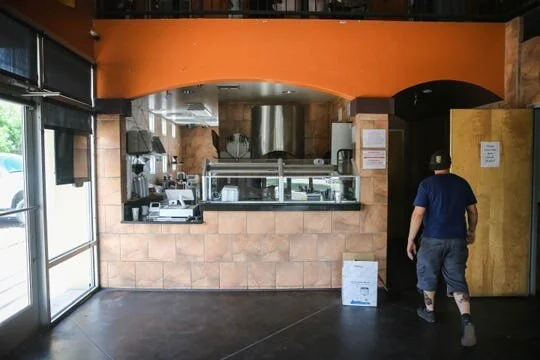 Wade McDonald walks around King Zah's Pizzeria on Thursday, May 14, 2020. The pizzeria, which has not yet opened, is in the same location as Zeffiro's New York Pizzeria on University. [Photo: Nathan Fish / Las Cruces Sun-News]