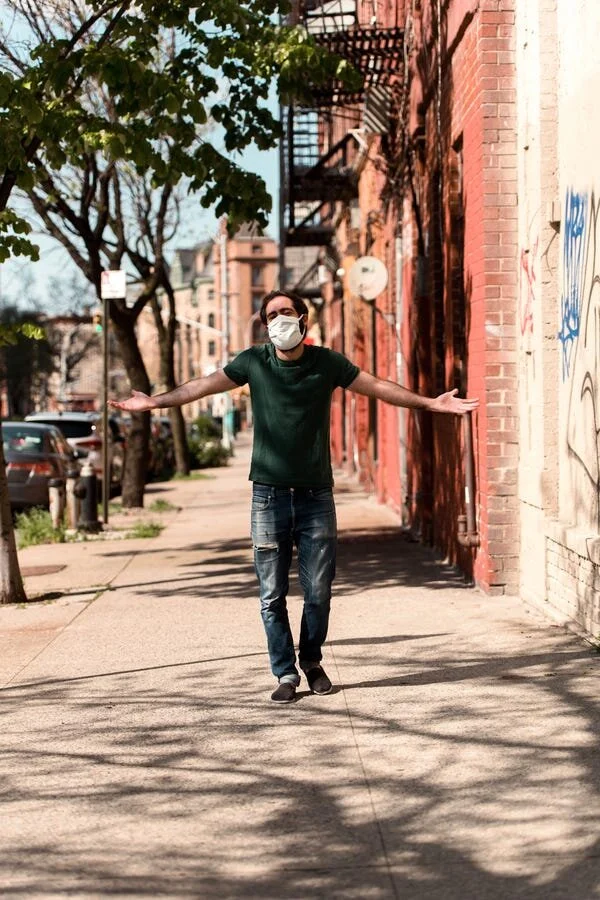 Las Cruces native Amer Jandali, donning a face mask, walks down the otherwise empty sidewalks of Brooklyn, New York, during the COVID-19 pandemic on May 3, 2020. [Courtesy Photo / Jordan Rathkopf]