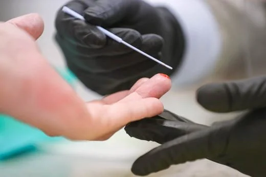 Las Cruces Sun-News reporter Damien Willis' blood is tested for COVID-19 at Vanguard Genetics and Alliance DNA Laboratory on the campus of New Mexico State University in Las Cruces on Friday, June 14, 2020. Willis tested negative for the COVID-19 an…