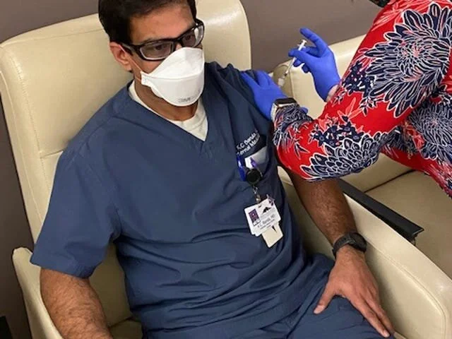 Dr. K.C. Banda is inoculated with Pfizer's recently-approved COVID-19 vaccine at MountainView Regional Medical Center in Las Cruces on Tuesday, Dec. 15, 2020. [Courtesy Photo: MountainView Regional Medical Center]