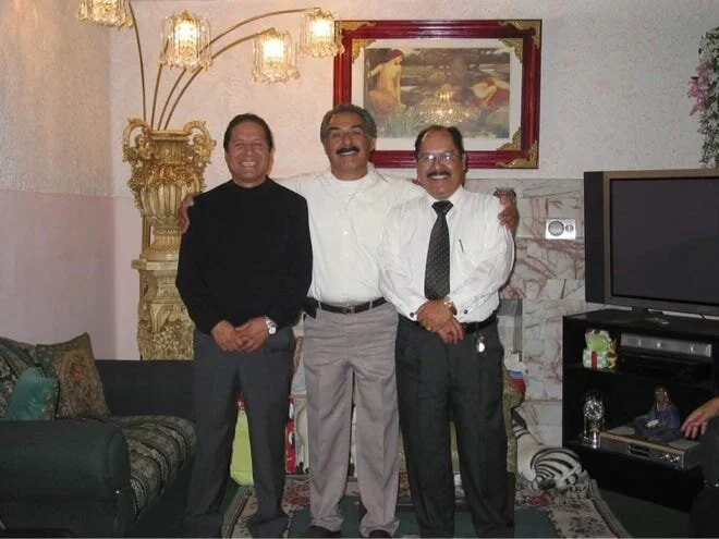 Sergio Vasquez, right, poses with relatives at a family gathering in this undated photo. [Courtesy Photo / Las Cruces Sun-News]