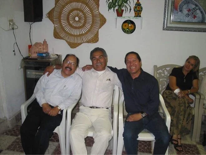 Sergio Vasquez, left, poses with relatives at a family gathering in this undated photo. [Courtesy Photo / Gabe Vasquez]