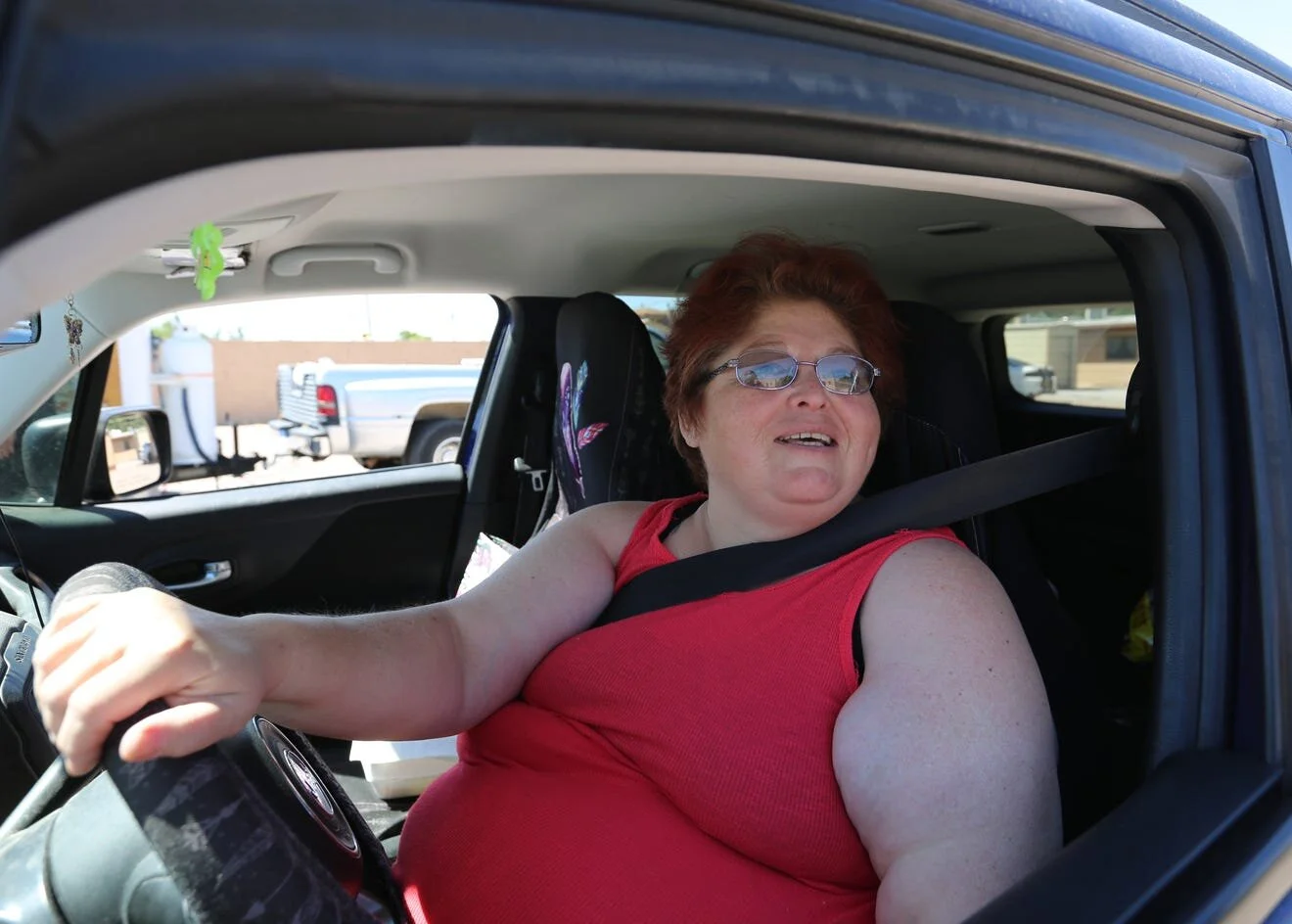 Las Cruces resident Dianne Gurule-Bartholf receives a free enchilada plate from La Nueva Casita Café on Tuesday, April 28, 2020. [Bethany Freudenthal / Las Cruces Sun-News]