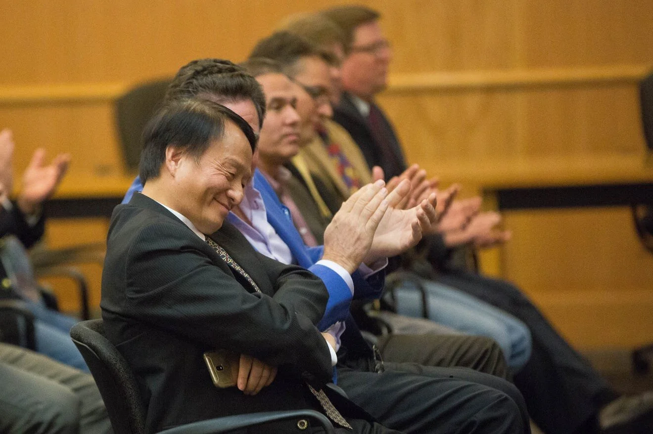 Attendees at a news conference Wednesday, Dec. 12, 2018, clap and thank Johnny Jan, center, for working with the state of New Mexico and Doña Ana County to bring an Admiral Cable manufacturing plant to Santa Teresa. [Josh Bachman / Las Cruces Sun-Ne…