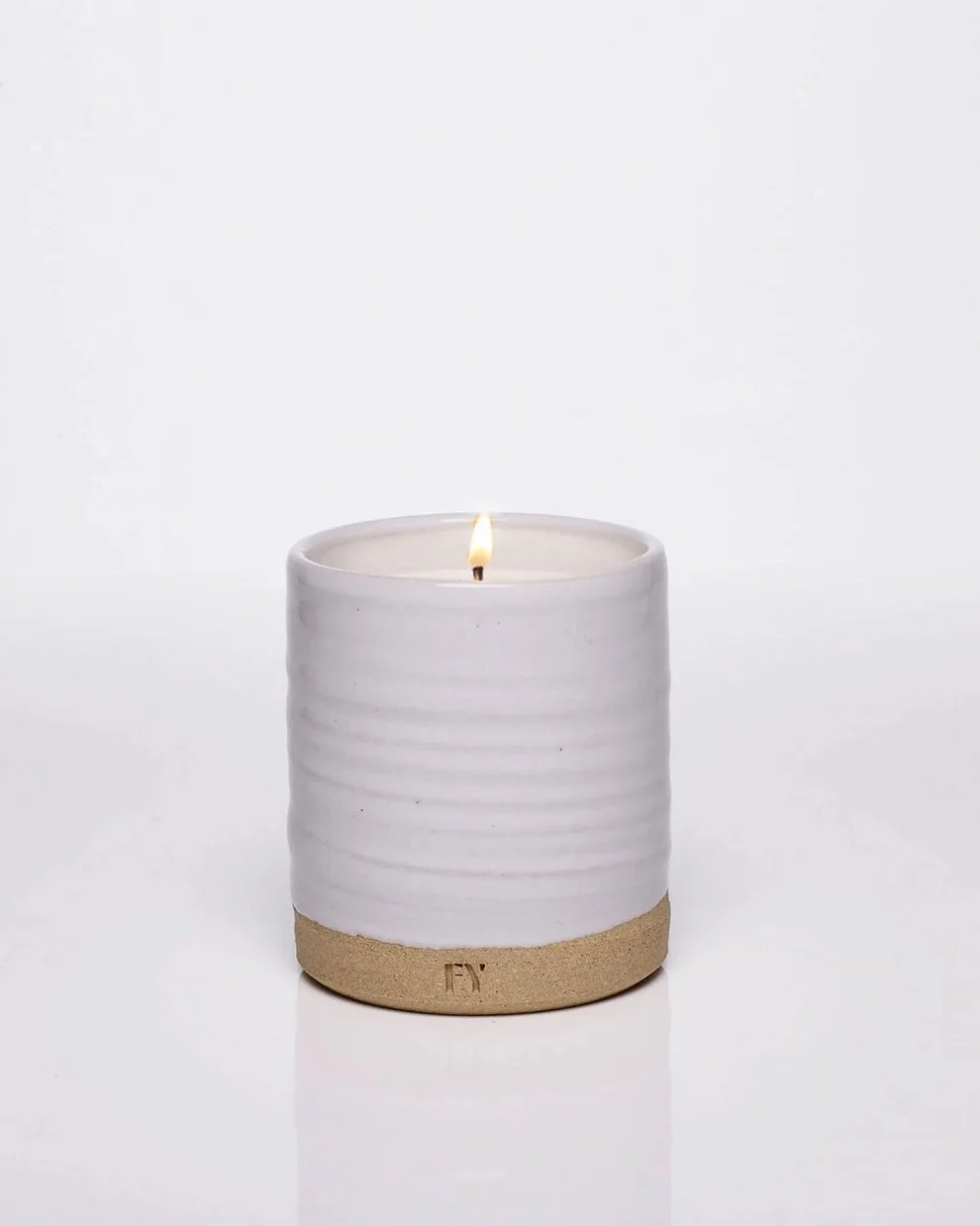FREE-YOURSELF_candles_handpoured_made-in-vermont_clean-fragrances_12oz_vessel_lit.jpeg
