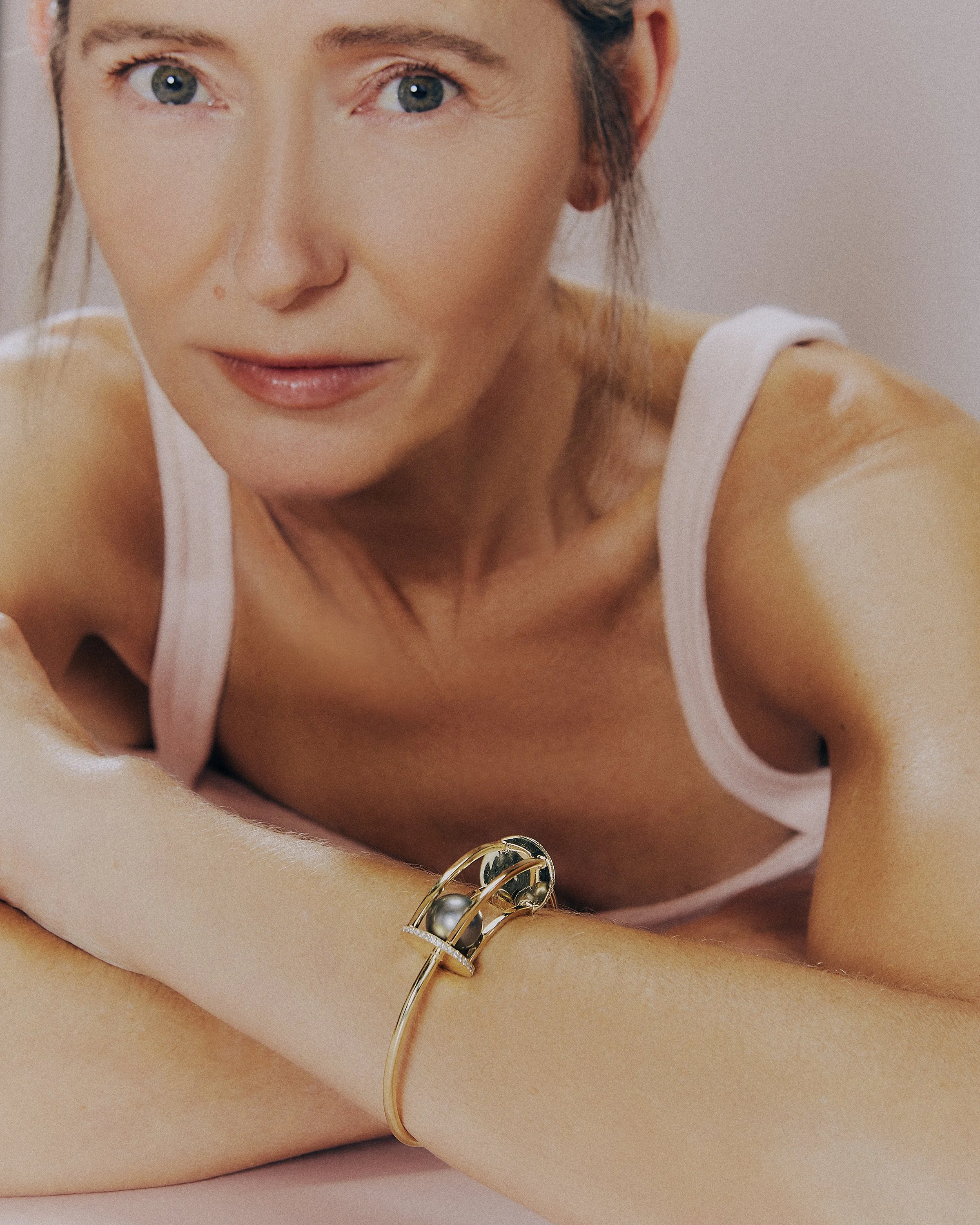 Yael Sonia Spinning Curve Bangle.jpg