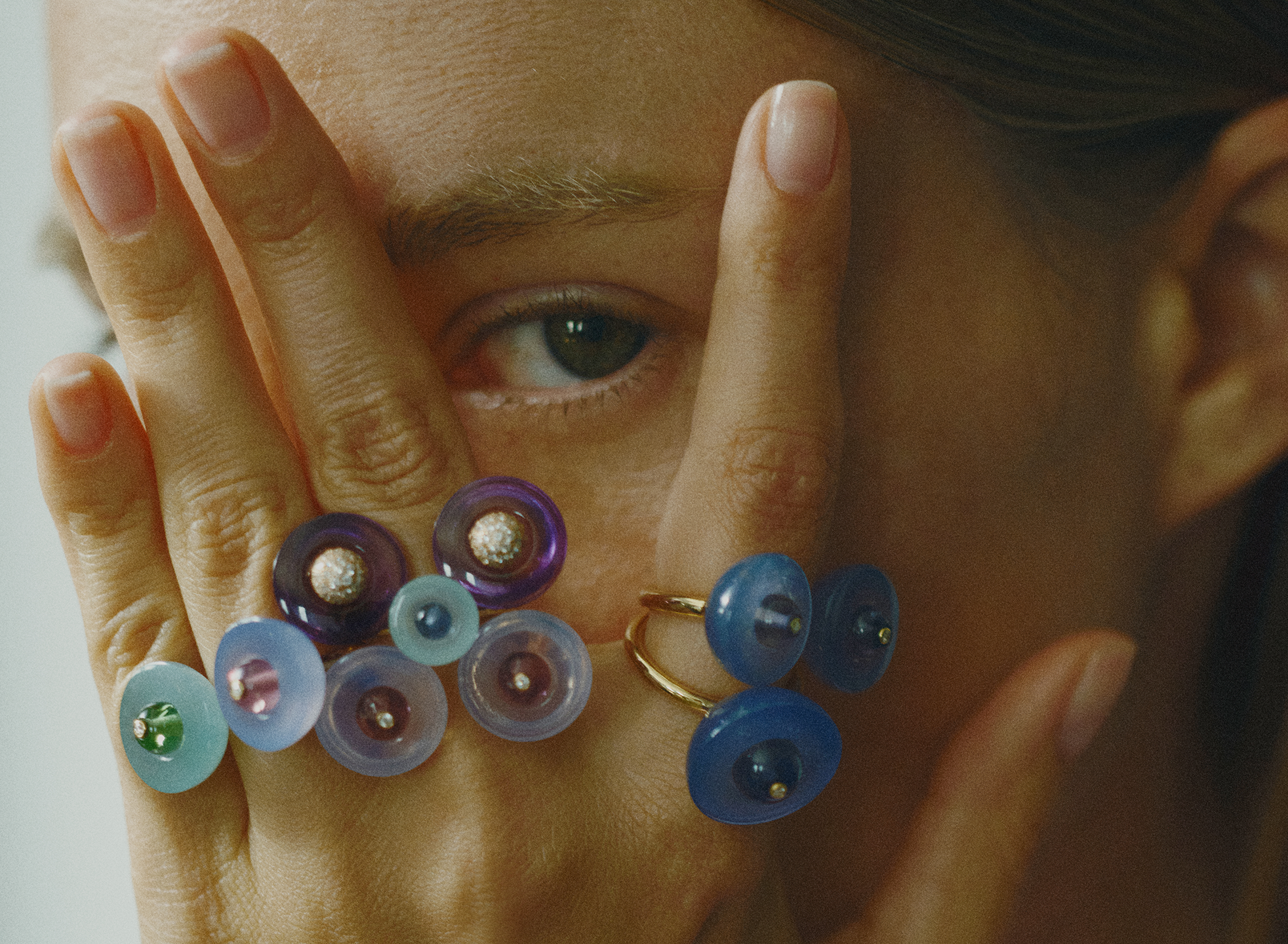 Yael Sonia Campaign Radiant Core all rings one hand.png