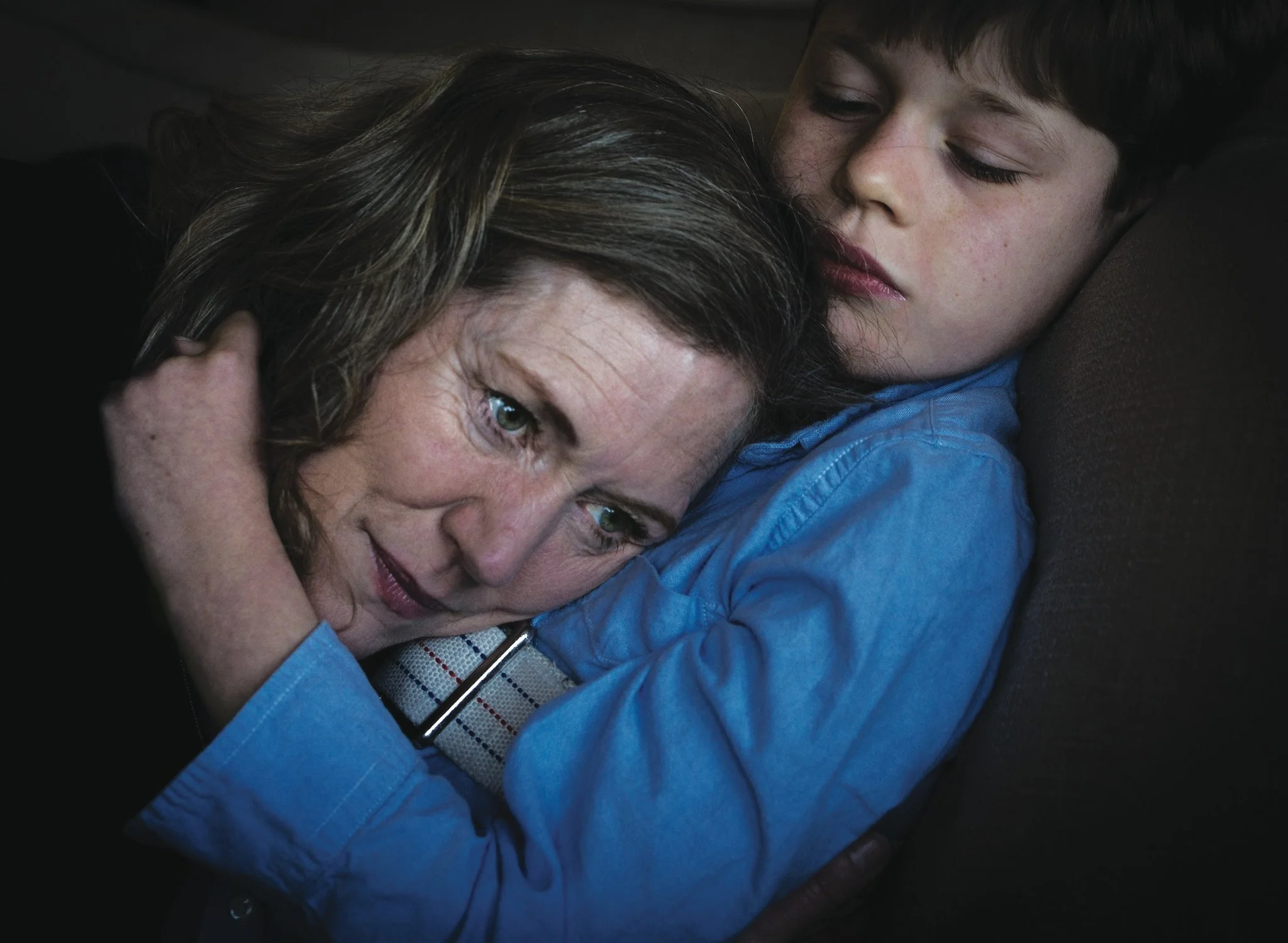 Catherine Jacobson and her son, Ben, at home in Mill Valley, Calif. His seizures have left him with very little ability to communicate, but one of his main ways of showing affection is hugging his mother’s head close to his chest. September Dawn Bottoms for The New York Times