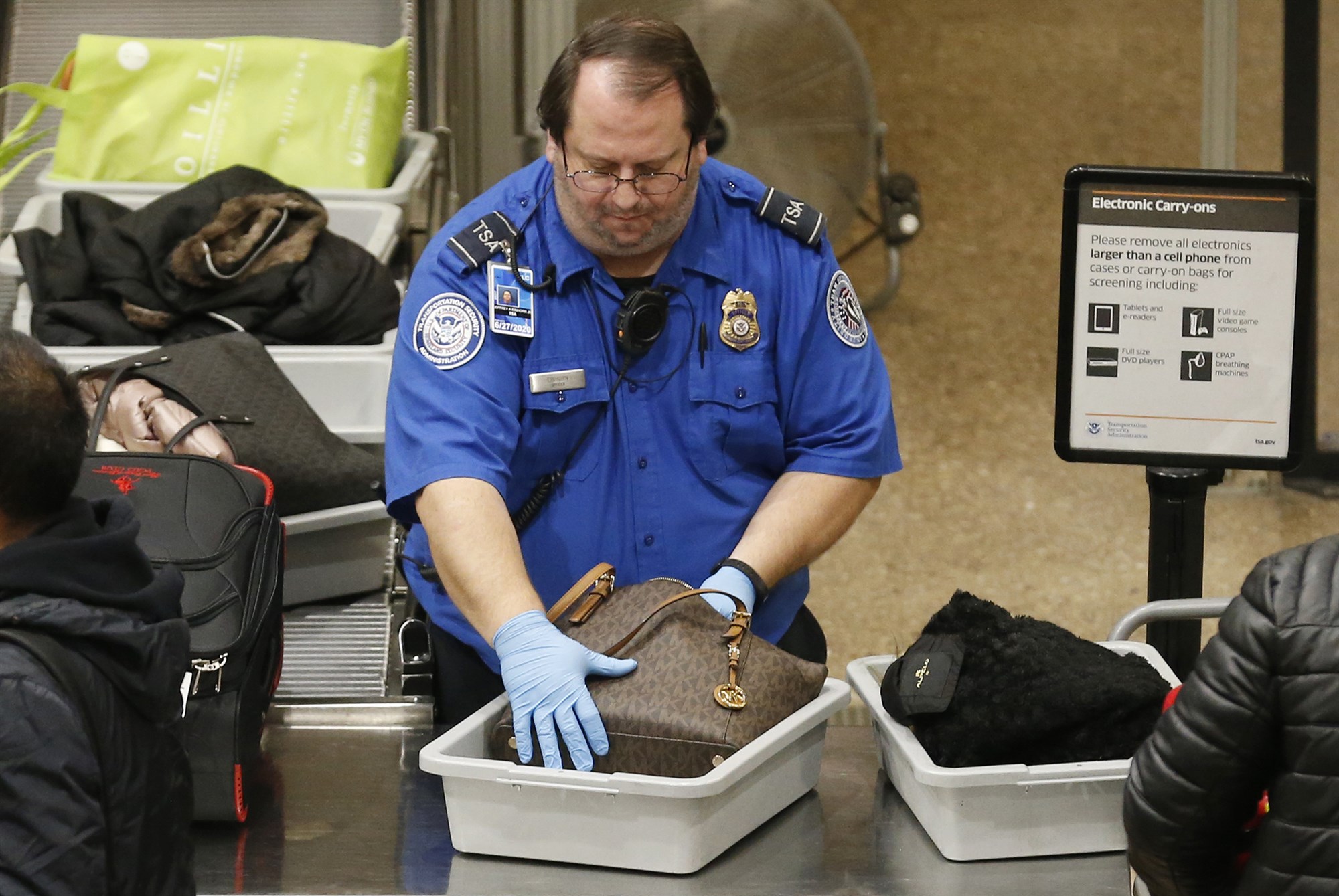 A TSA worker at the Salt Lake City International Airport on Jan. 16, 2019.Rick Bowmer / AP file