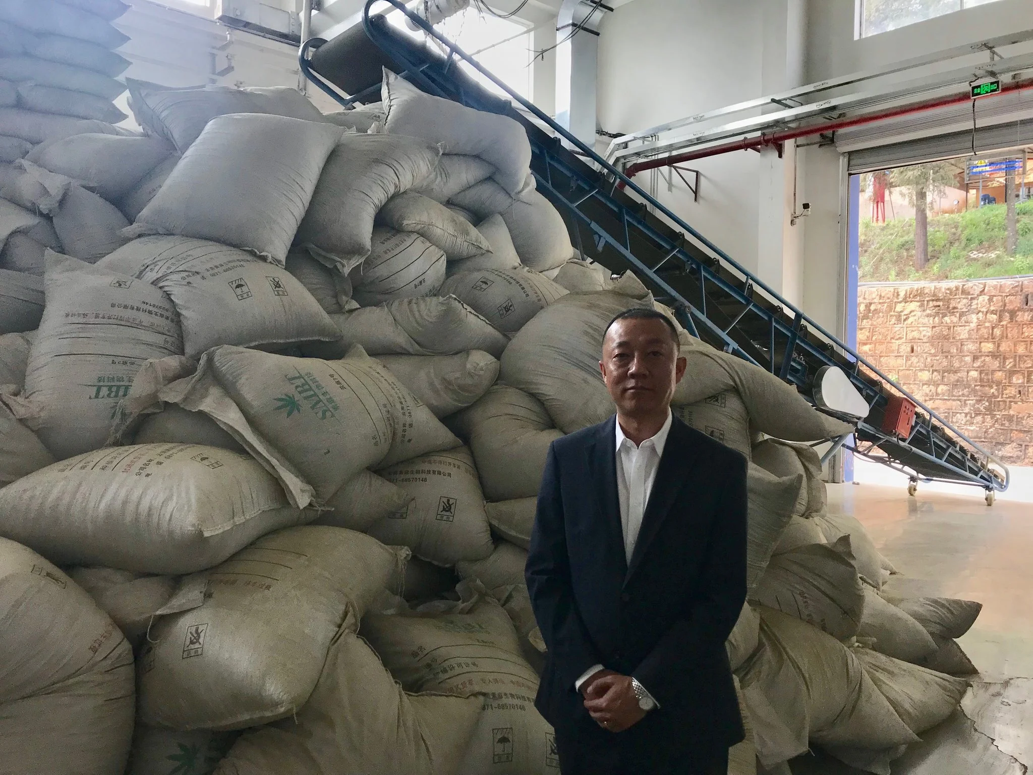 The company Hempsoul extracts cannabidiol from the hemp it grows on more than 1,600 acres in Yunnan Province. “It is very good for people’s health,” said the general manager, Tian Wei.CreditSteven Lee Myers/The New York Times
