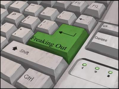 Freaking-Out--on-a-white-Keyboard-with-a-Green-colour-enter-button_n.jpg