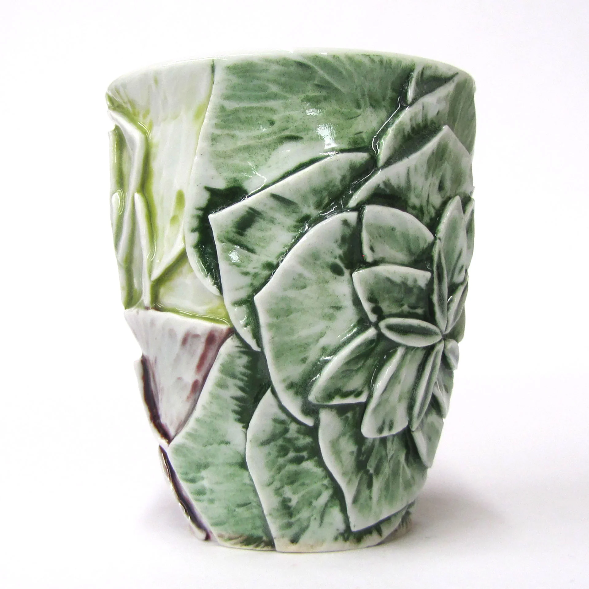 Green succulent flower front 2 roses