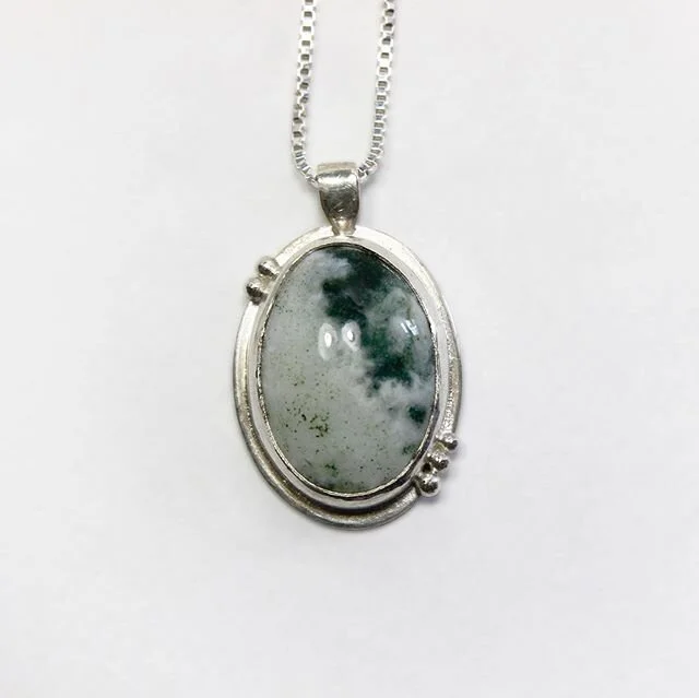 April 6th is my parents anniversary, they celebrated 29 years together. I made them each a necklace, both with stones my dad gave me years ago. They both have elements of our family in them. This one is my moms! This stone is green, and that&rsquo;s 