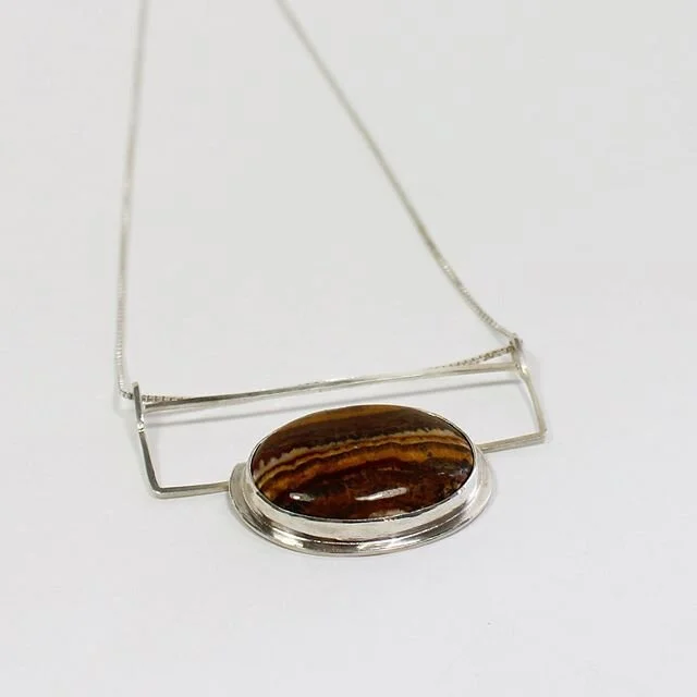 Finally, some jewelry photos! This piece is a revisit to bezel setting for me! The stone (if you know what type it is please let me know in the comments!) is one I got from college, and it belonged to a small production line I made back then! I wish 