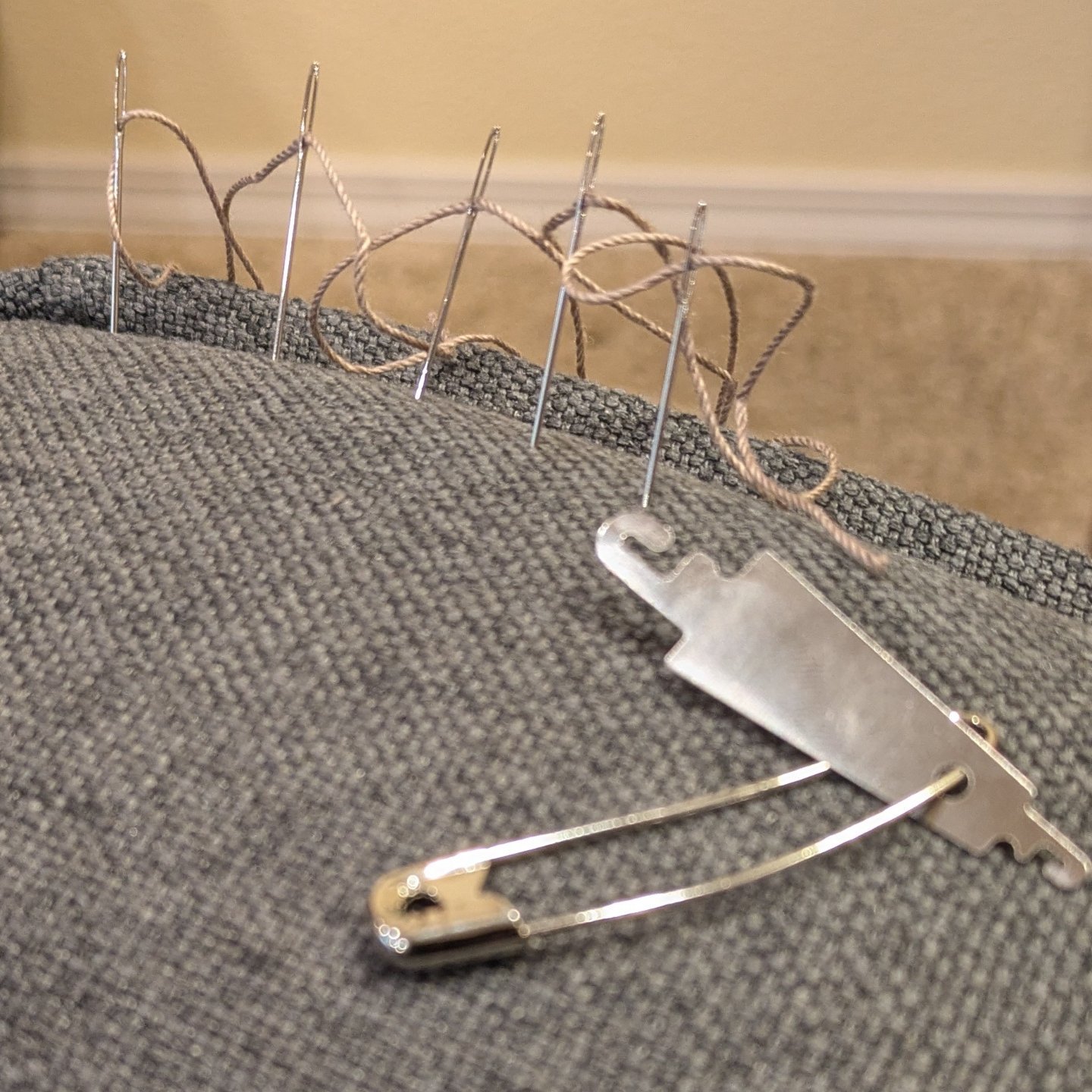 I highly recommend:
1. Threading many needles at once.
2. Putting your needle threader on a safety pin so it's more difficult to lose.