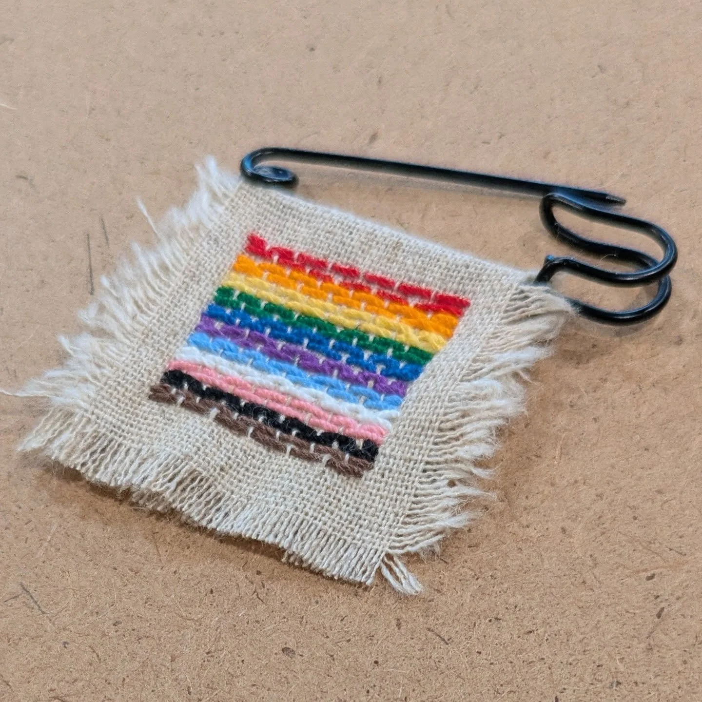 ❤️🧡💛💚💙💜🩵🤍🩷🖤🤎
.
I picked up a sweet 🌈 button at Portland's Saturday Market a few weeks ago (Thanks @shanereaneystudios ) and I've been wearing daily as a small act of love. 
.
Of course I wanted to make a version with needle and thread. I'v