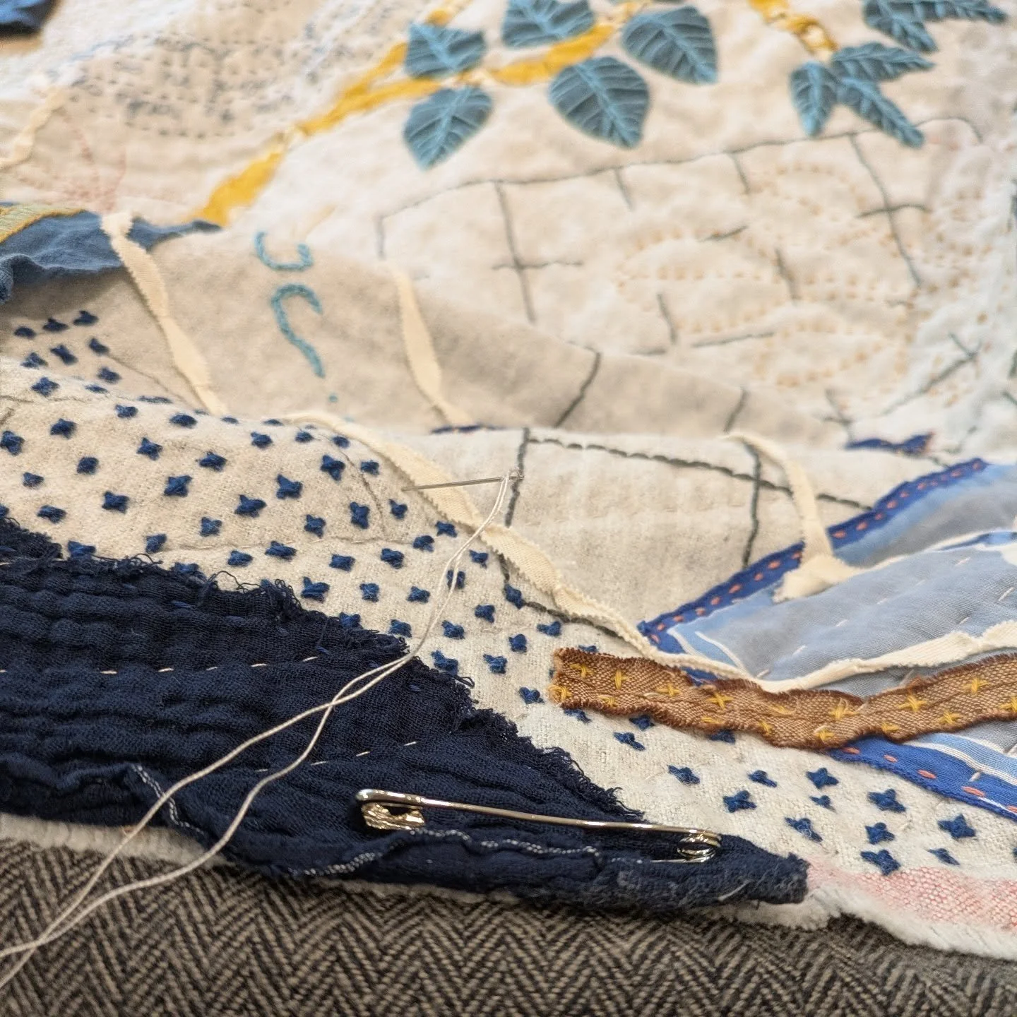 This quilt has been in progress for 2+ years and I've got momentum to finish it. At this point, the decisions are pretty much made, and it's just putting in the time to complete the quilting and binding. And hanging sleeve and label. So yeah, it's no
