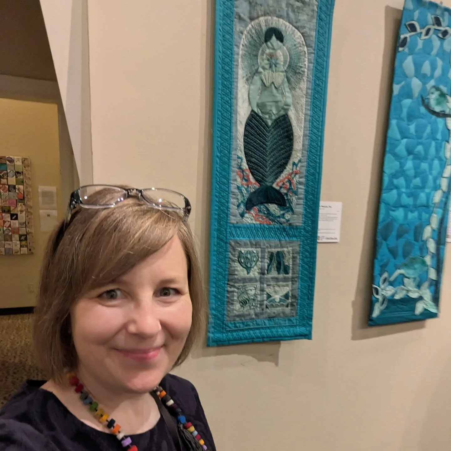 Today was the opening and artists' reception for Obsessed with Color. The show was created by members of High Fiber Diet, a Columbia Fiberarts Guild special interest group. 
.
As you can see, the show celebrates the color spectrum. Each artist chose 