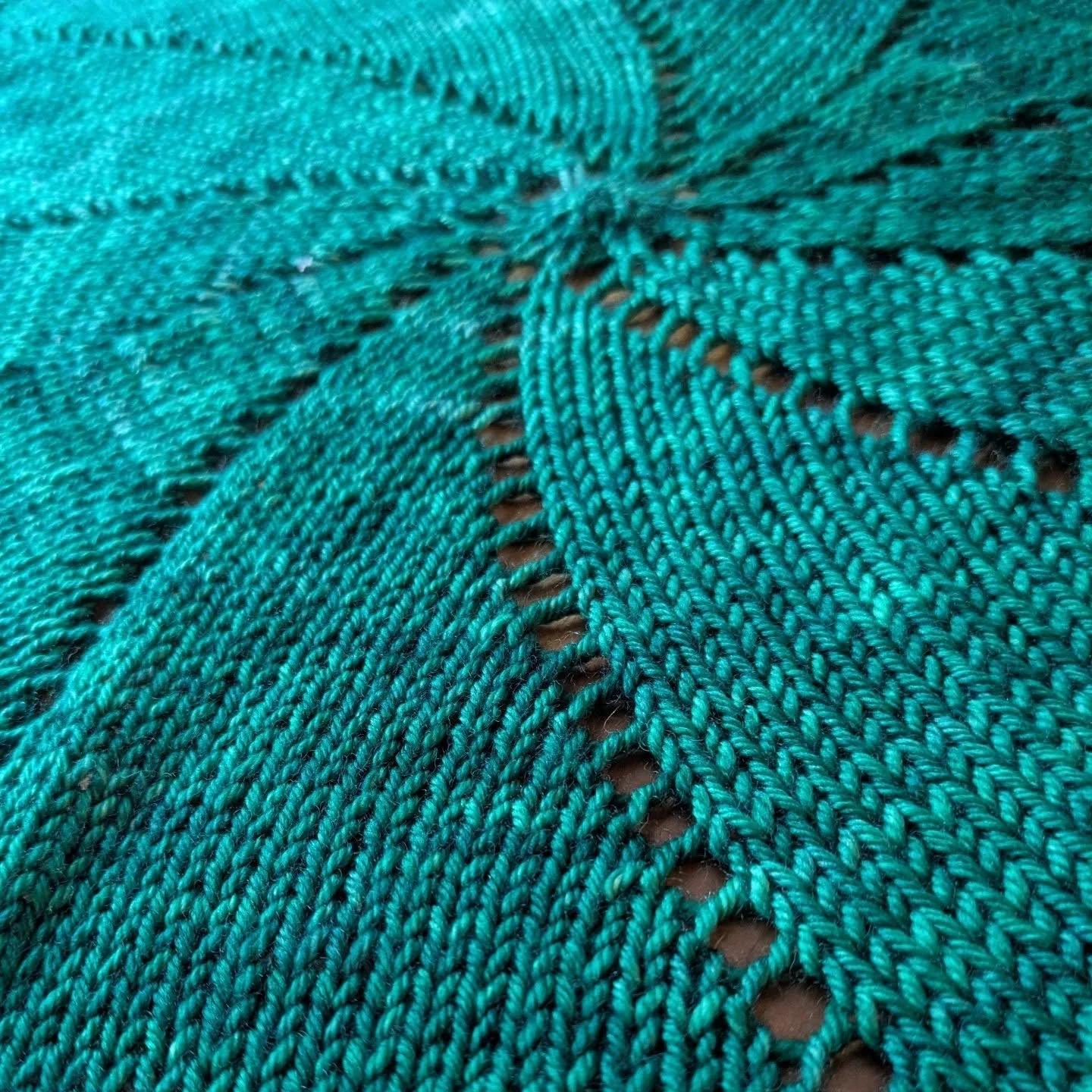 From the previously mentioned yarn liquidation, I pulled out this skein of Madeline Tosh worsted (color: malachite) and knit up a doily of sorts. This is a gift for a very generous friend who loves all shades of green (and she is not on social media 