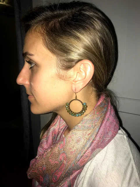 Here’s a close up of the dangle earrings and scarf. I bought these pieces separately, but I love the way the teal earrings pick up the hints of blue in the scarf.