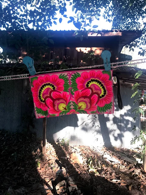 The gorgeous embroidered clutch I scored at the Chiang Rai night bazaar. Clearly, there is some progress to be made in terms of my fashion photography skills…