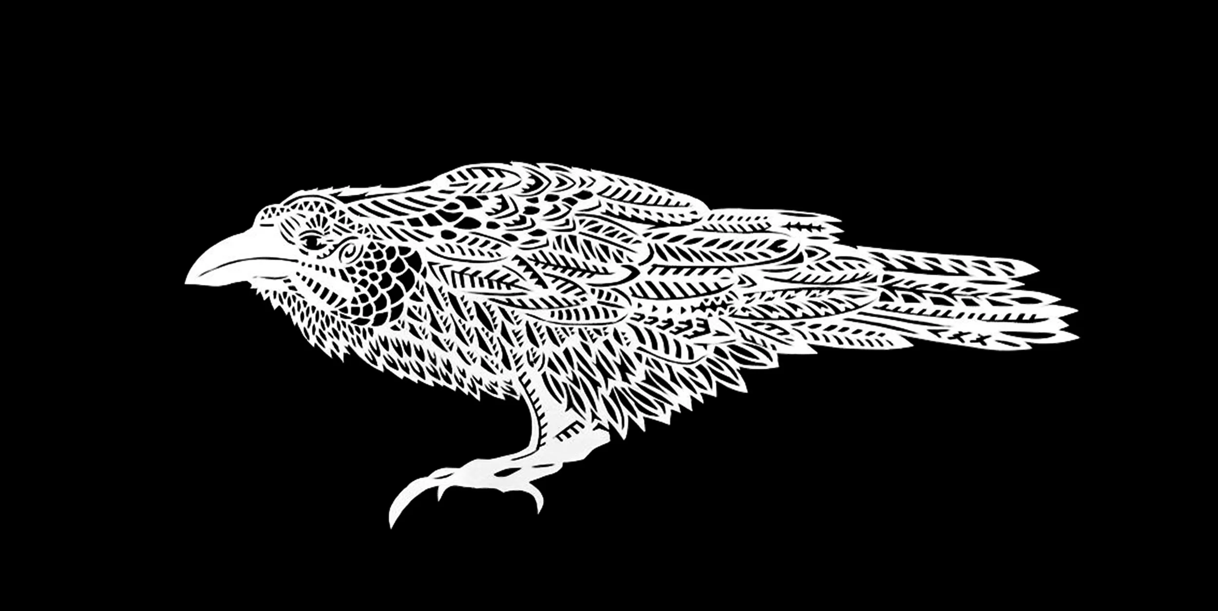 A papercut artwork of a crow made on commission by Thysart