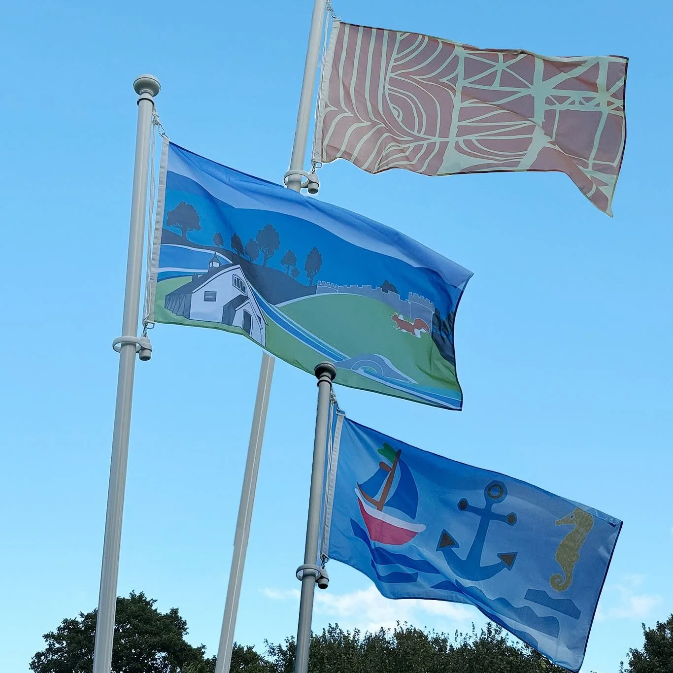 Flags Flying in Llangoed - the FLAGS :) post 1/4 @llangoedvillagehall once again has a flagpole, with flags to represent our community and celebrate special events. 

The first three we&rsquo;d like to share are from Ceyda Ozkay, Anita Molhotra and D