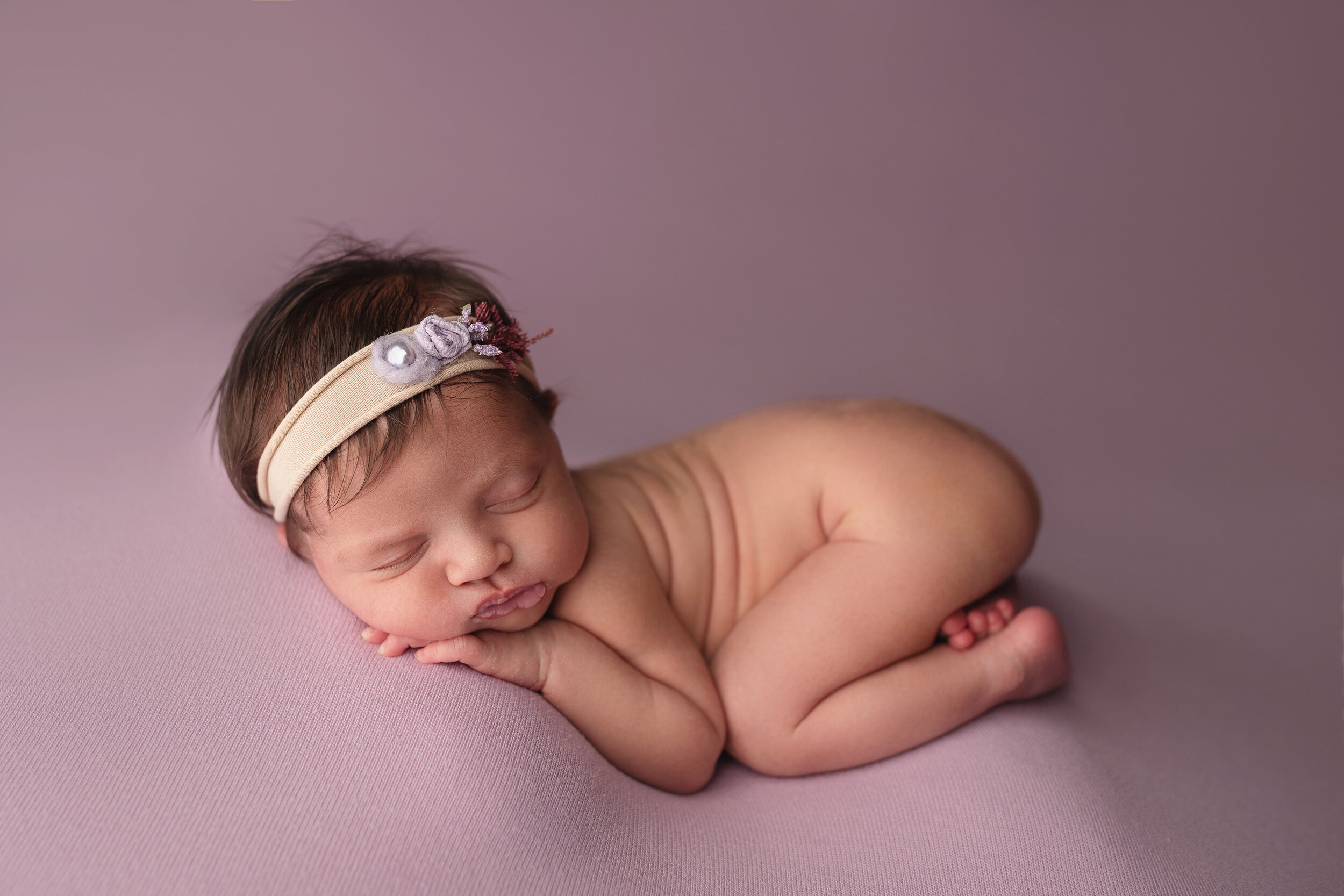 Morgan city Newborn Portrait Studio baby girl purple