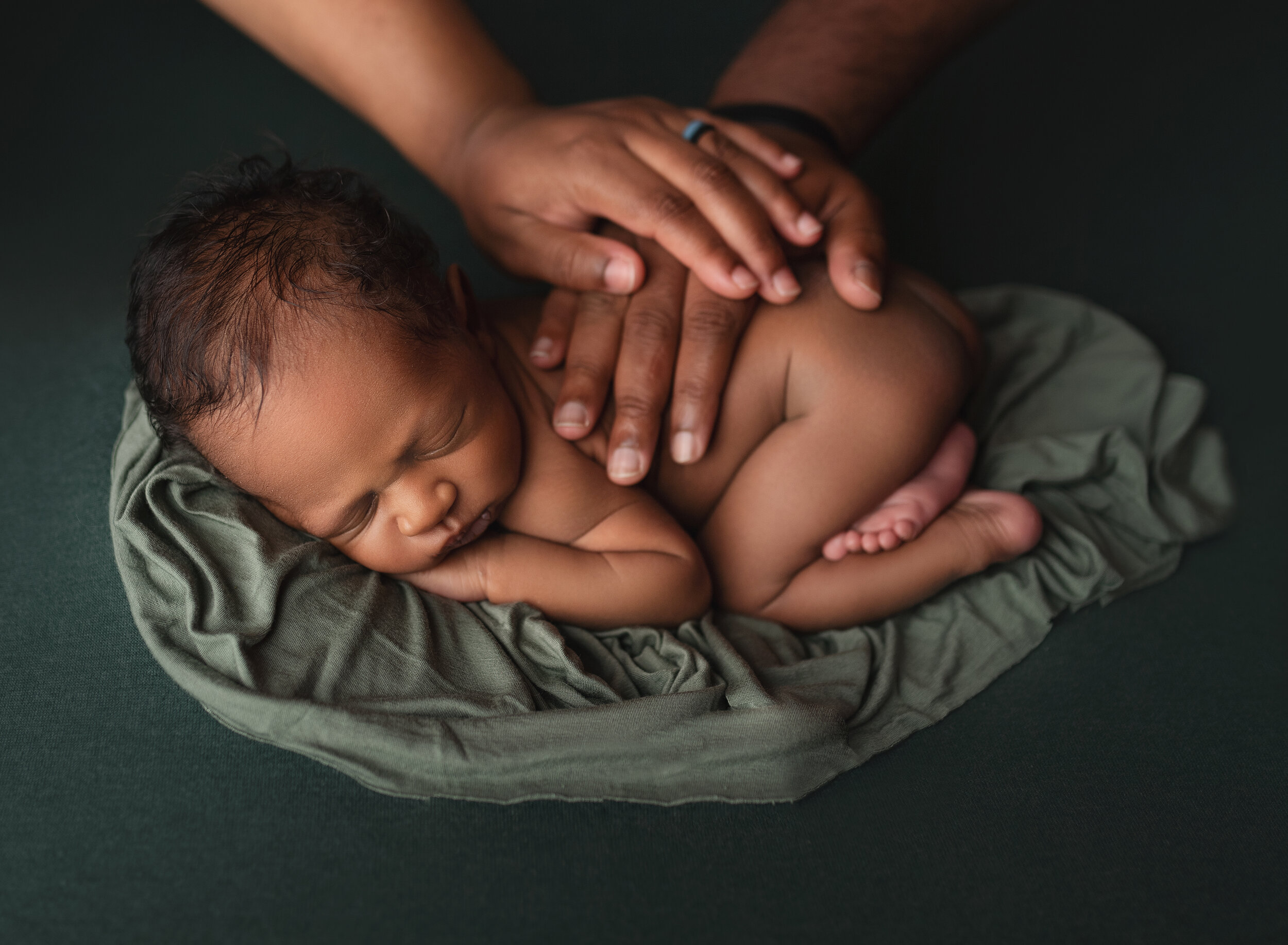 Morgan City Louisiana Newborn Photography baby and parents hands