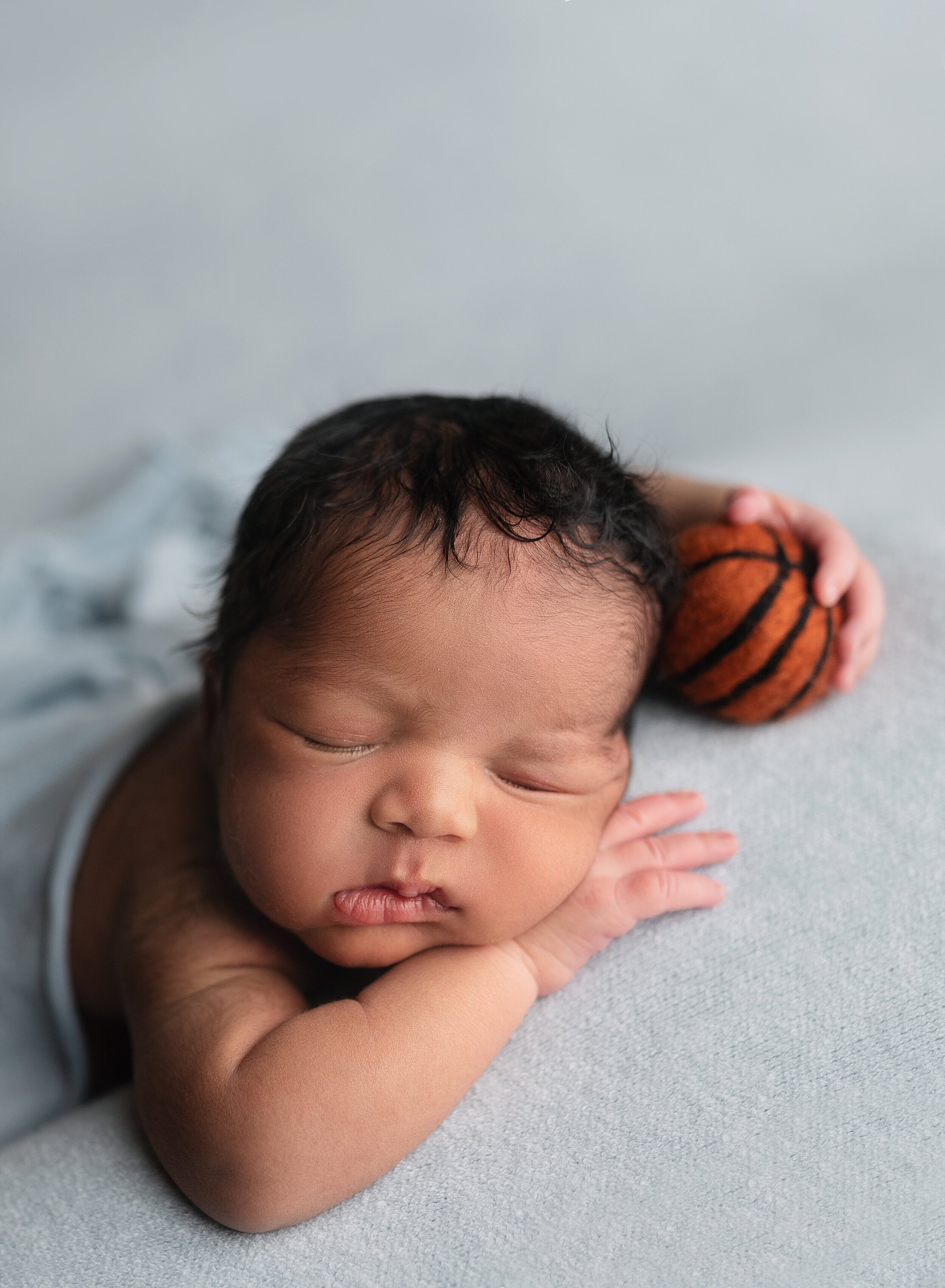 Morgan City Newborn Photographer baby boy basketball