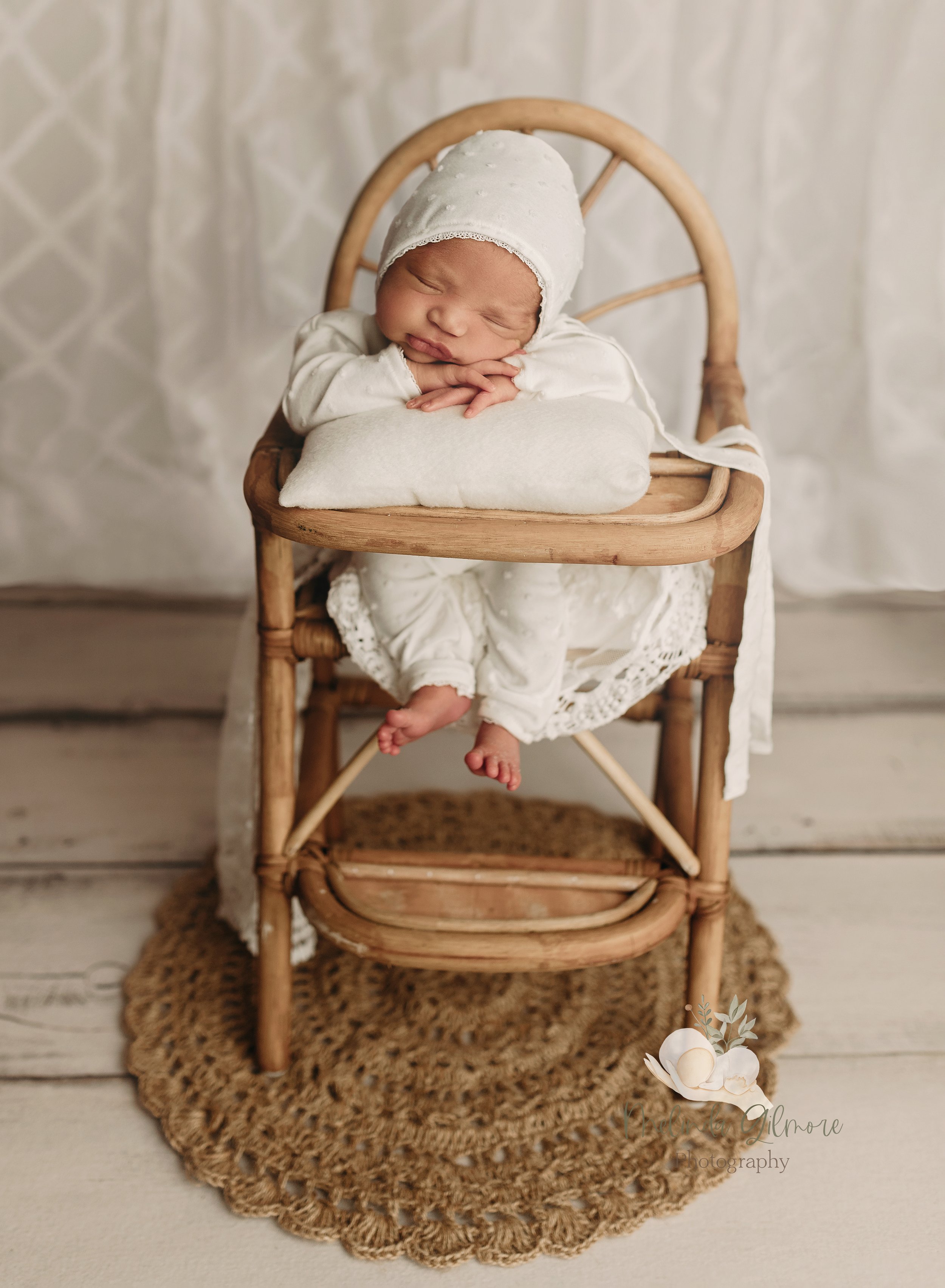 newborn girl wicker high chair prop