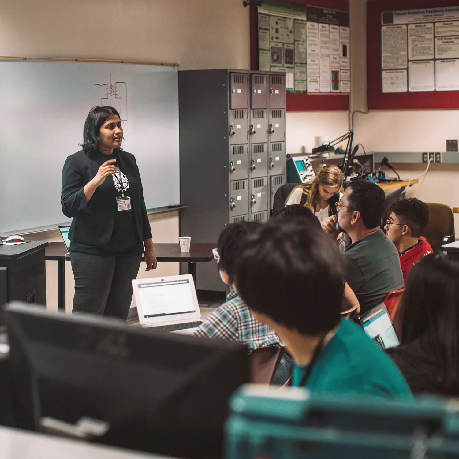 Manvitha Ponnapati (MIT) lectures UNLV students on the use of Arduino at the 2018 Las Vegas Make-A-Thon organized in conjunction with at-LAS .