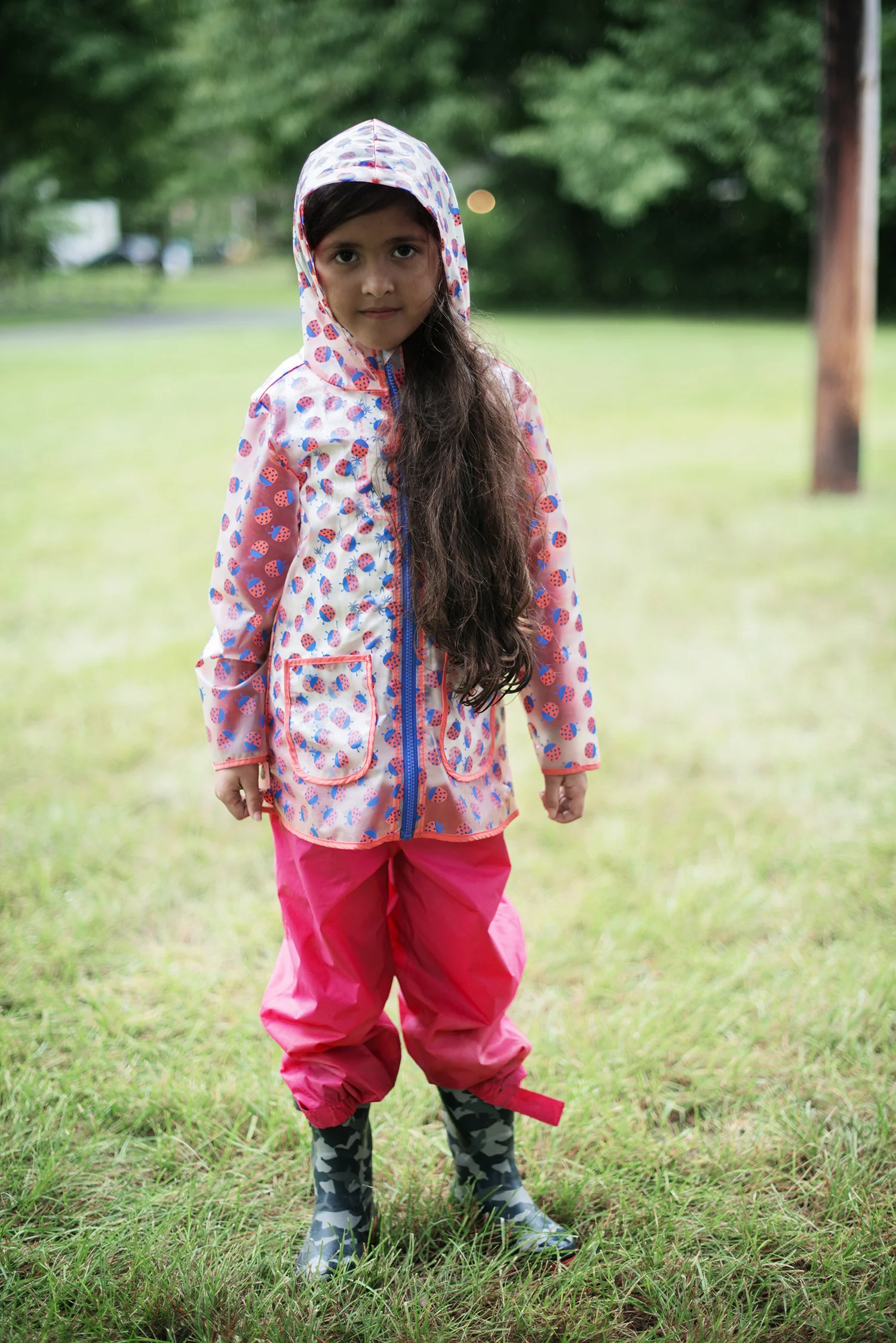 child in raincoat and rain boots.jpg