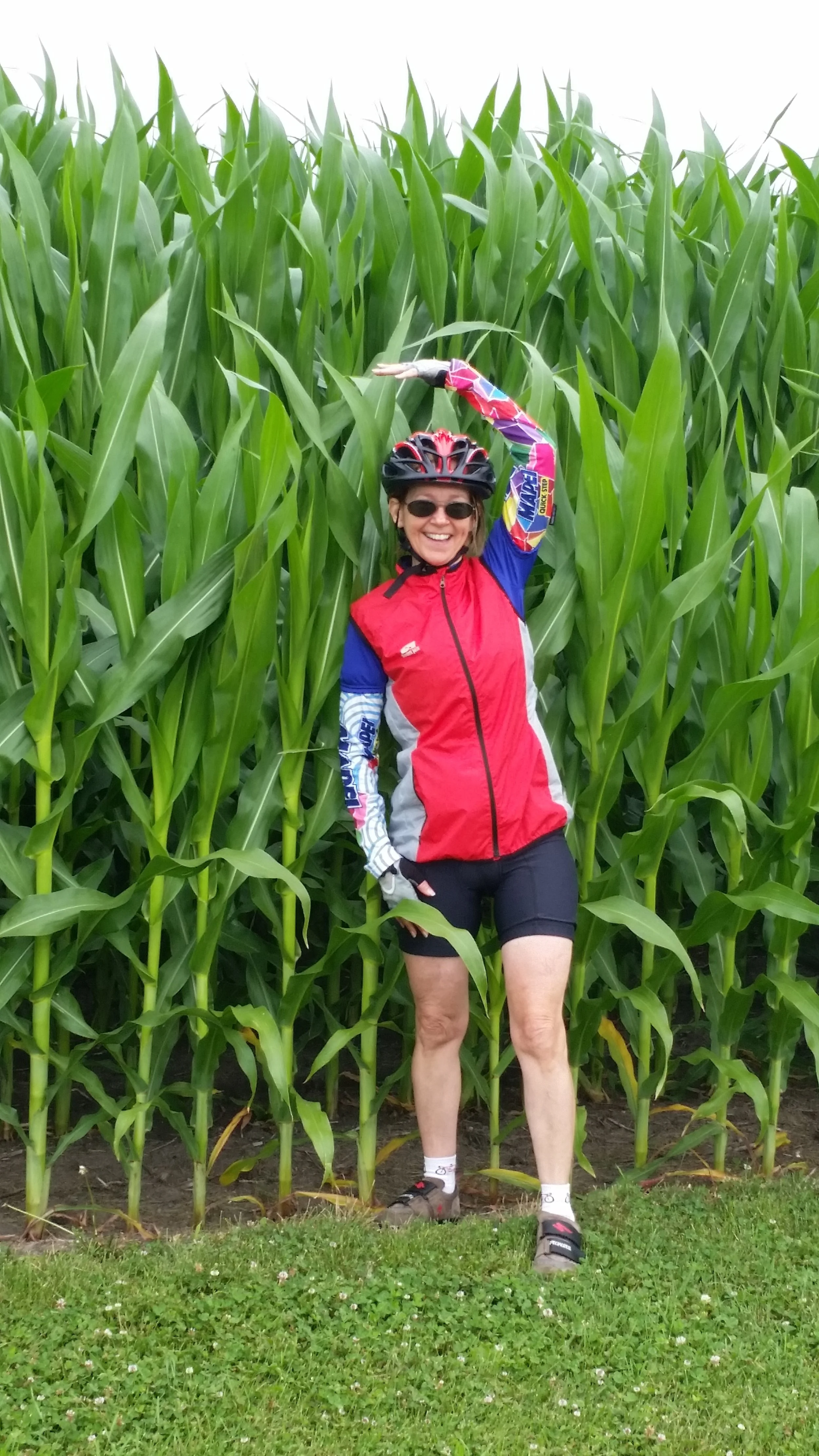 Virginia checking corn height.